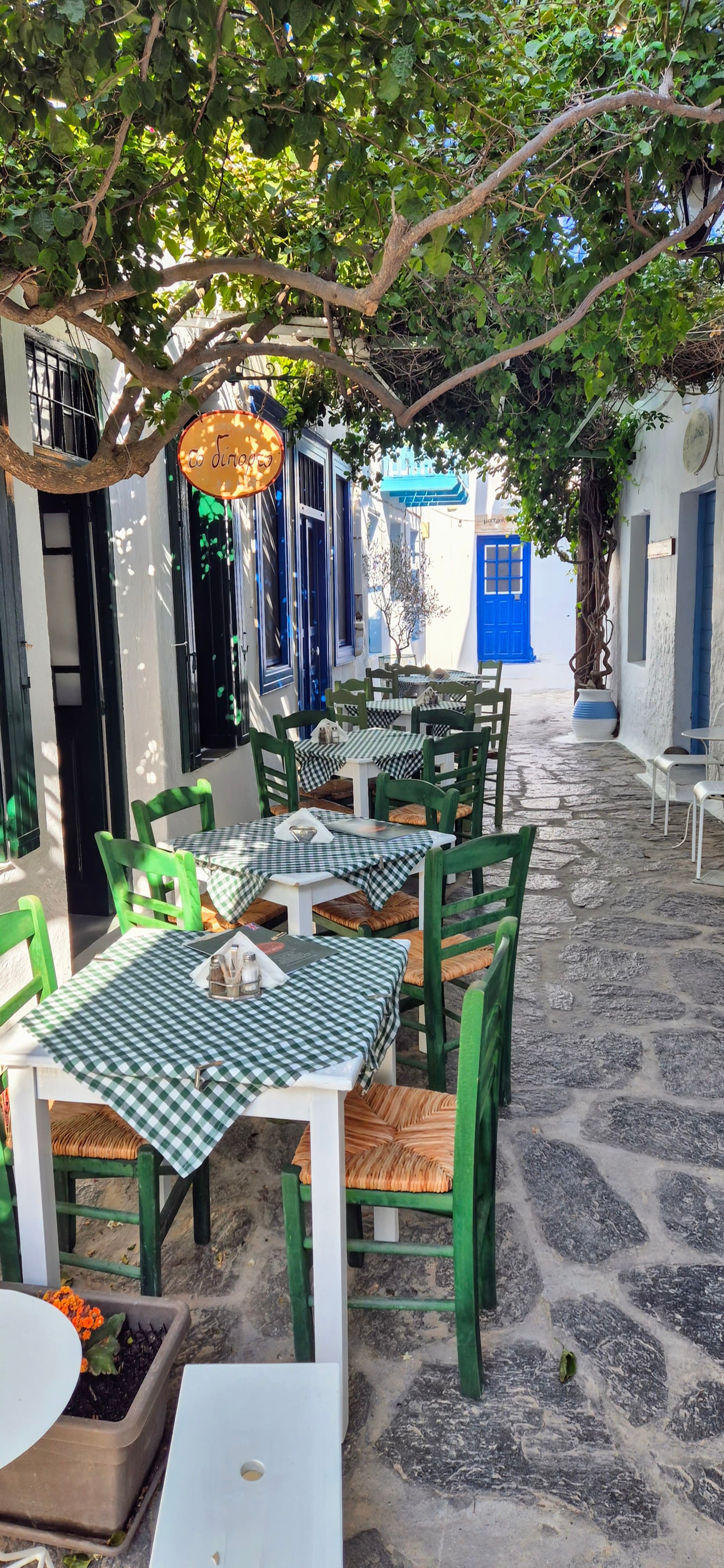 Instagrammable Cycladic alley seating at Diporto